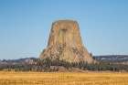 Devils Tower National Monument, a rare form of igneous rock, rises out of the Wyoming landscape. Art Print